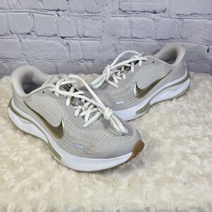 Nike Women's Cream and Gold Sneakers
